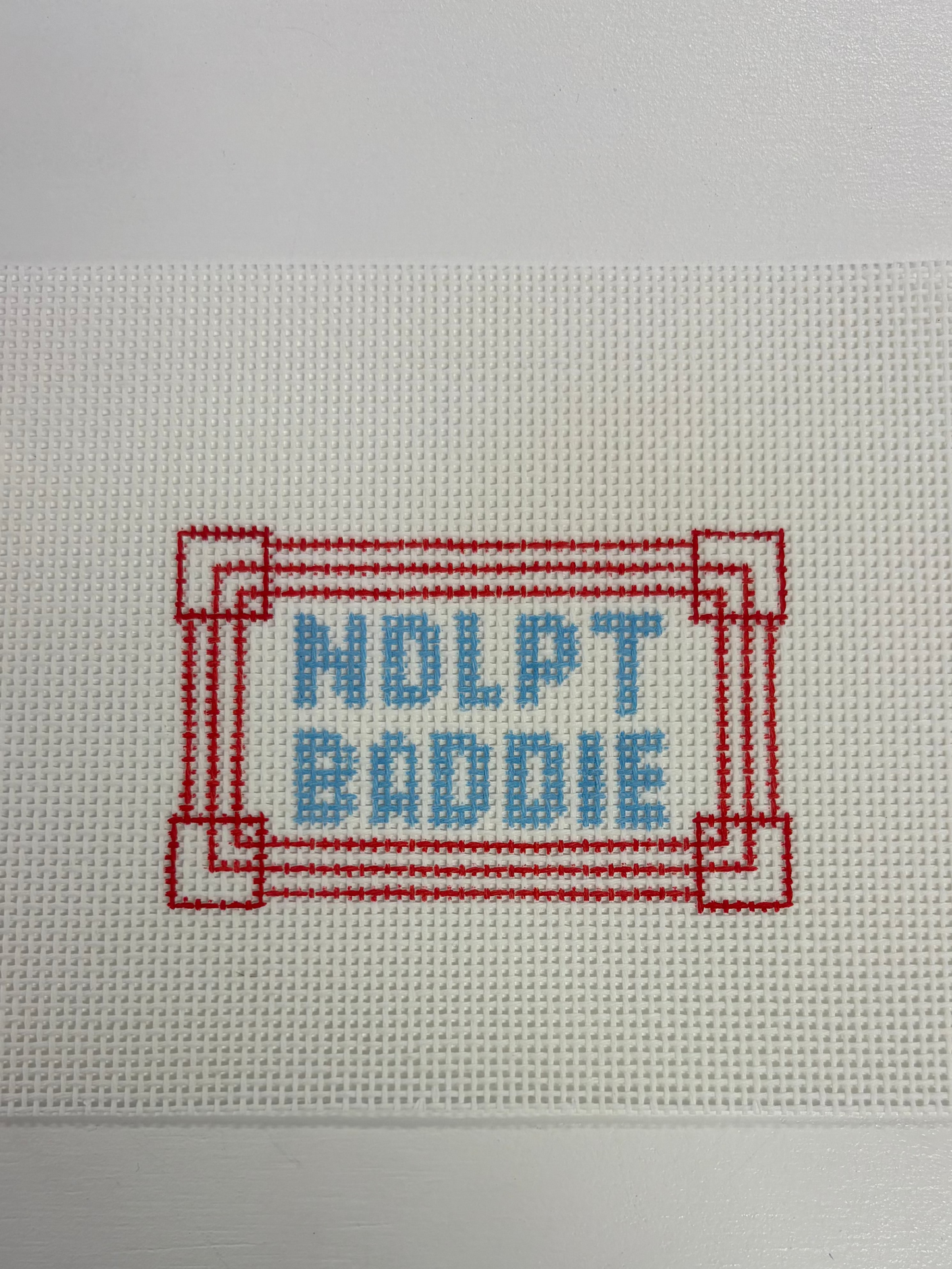 Blue/Red Needlepoint Baddie