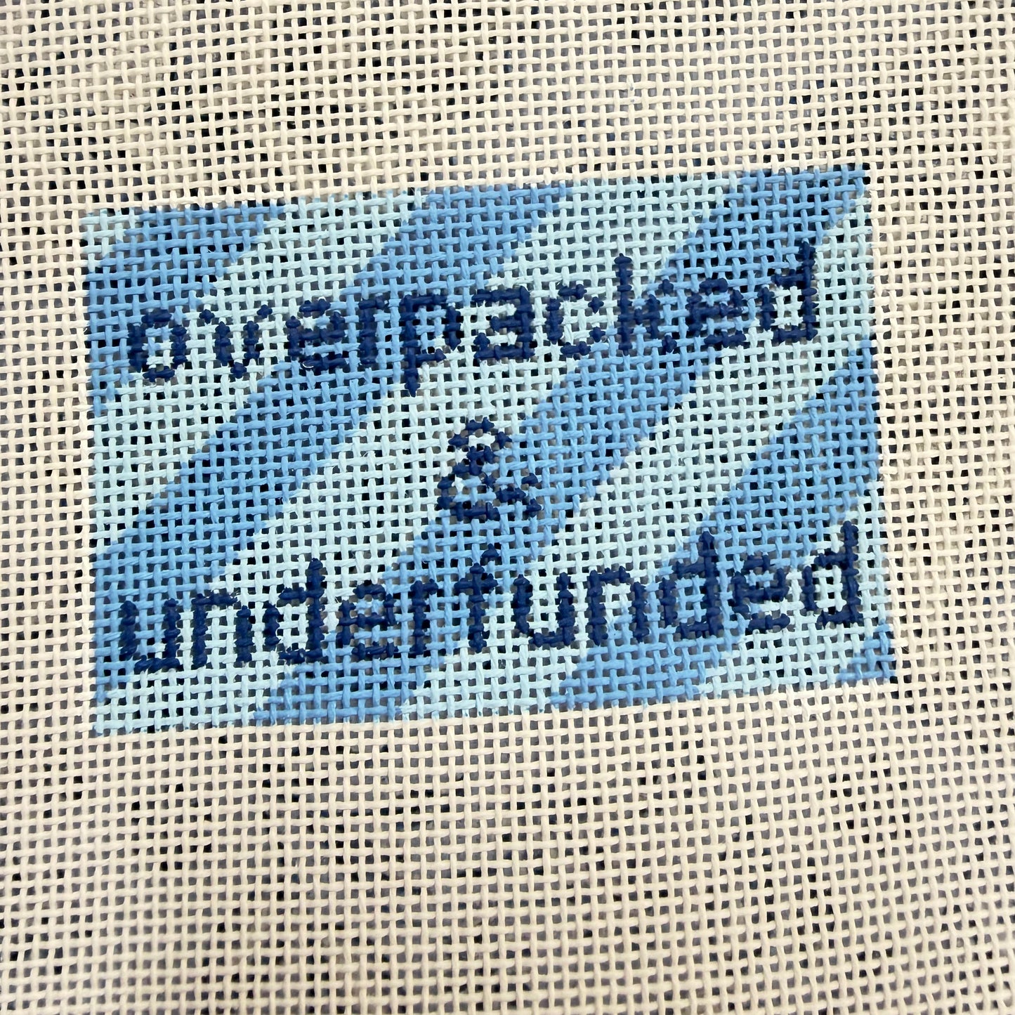 OVERPACKED & UNDERFUNDED