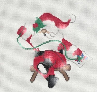 Needlepointing Santa