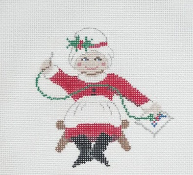 Needlepointing Mrs. Claus